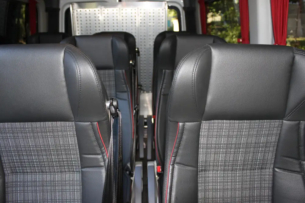 Comfortable leather seats inside a Shuttler minibus
